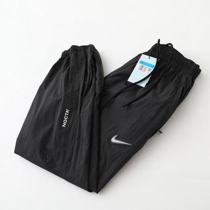 Nike NOCTA Tech Woven Pants  Black