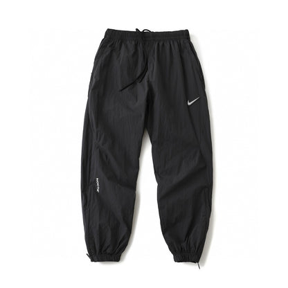Nike NOCTA Tech Woven Pants  Black